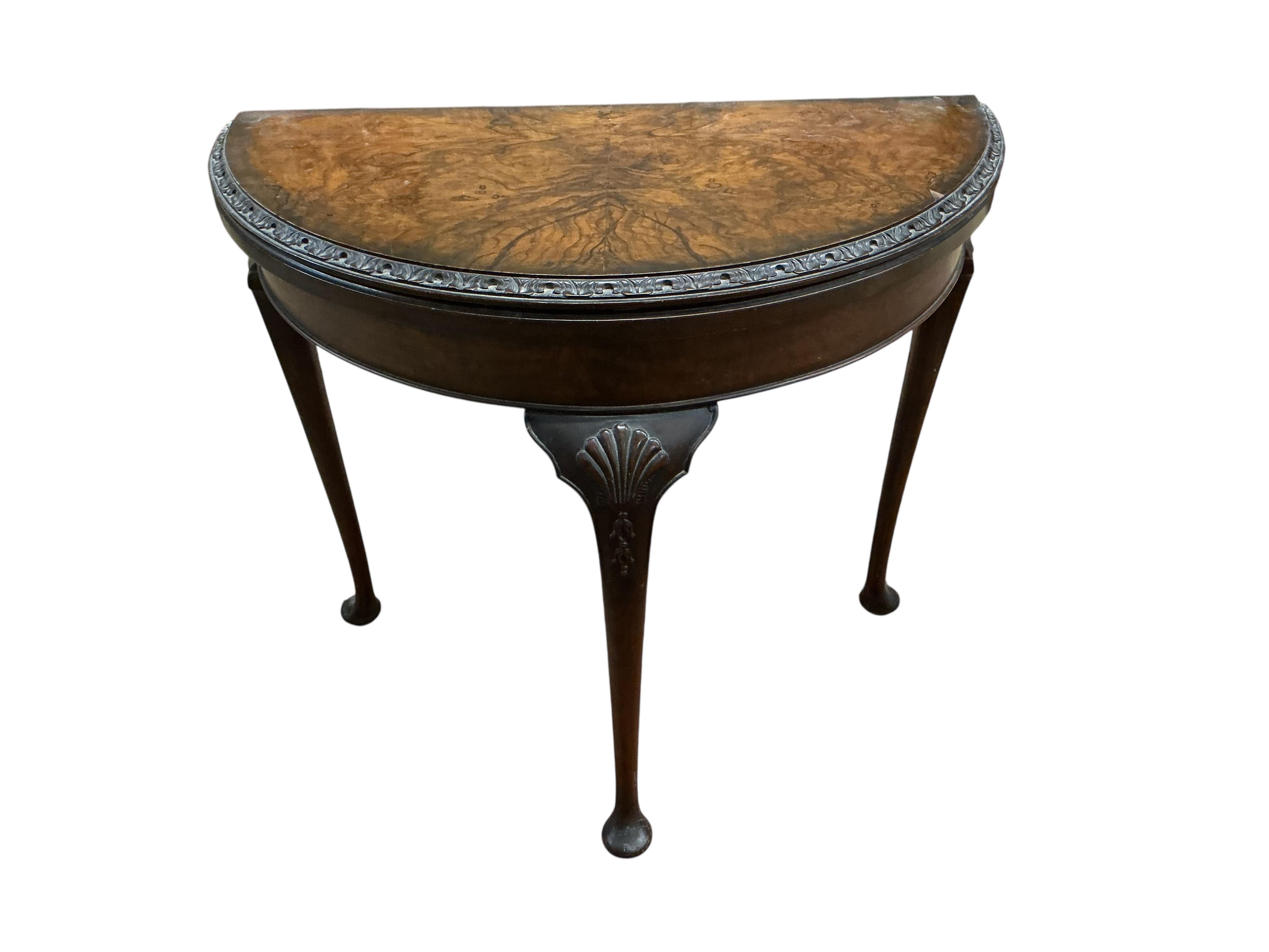 A Queen Anne Revival walnut demi lune folding card table, width 80cm, depth 42cm, height 74cm
